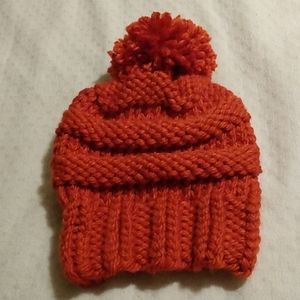 Hand-knit orange stripe hat